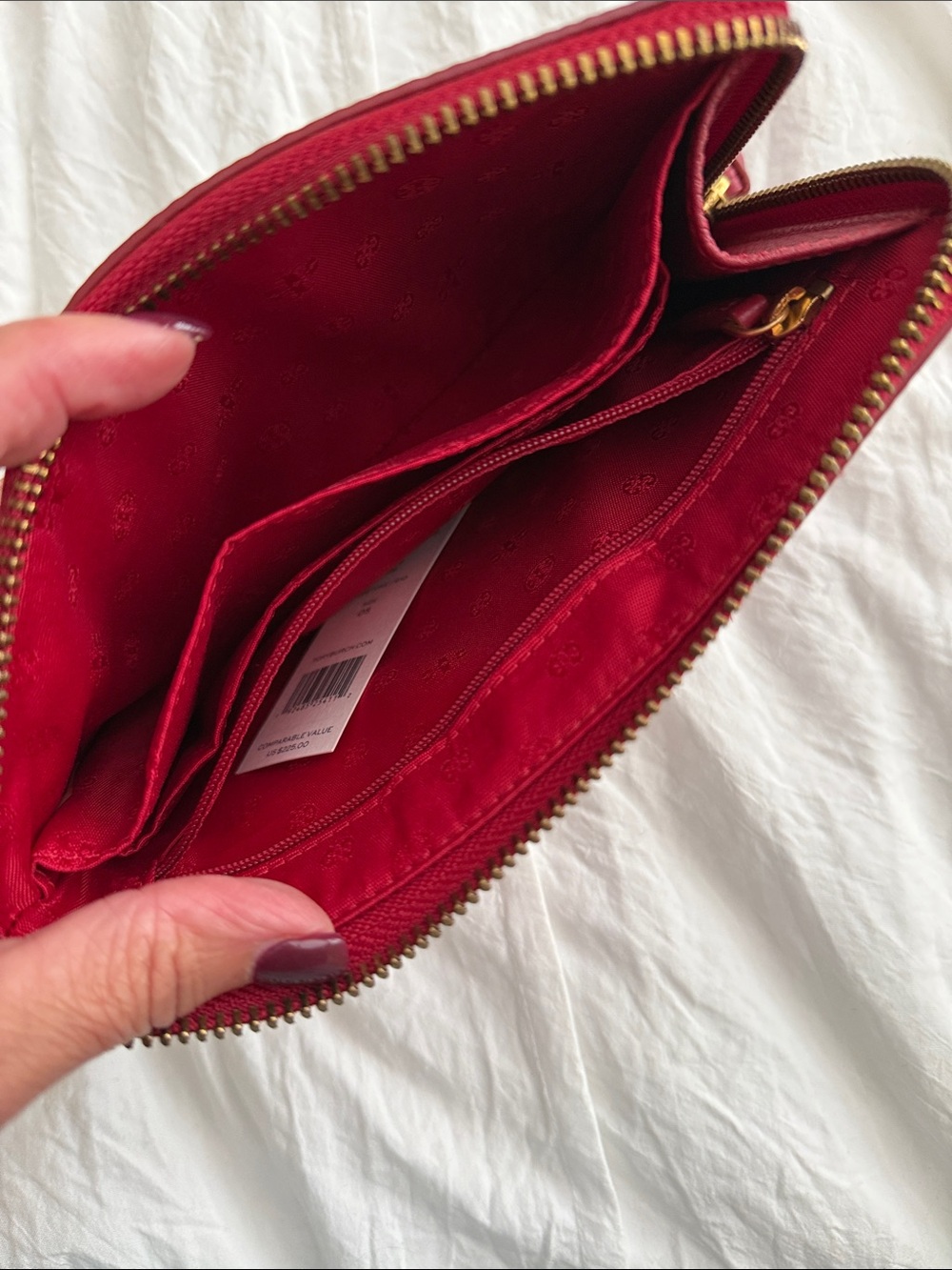 Tory Burch Garnet Pebbled Leather Wristlet with Gold Logo - Picture 4 of 4
